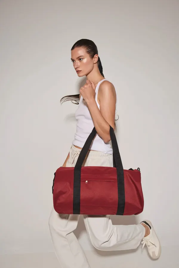 Sac tubulaire recyclé avec poche frontale porté — vue 1