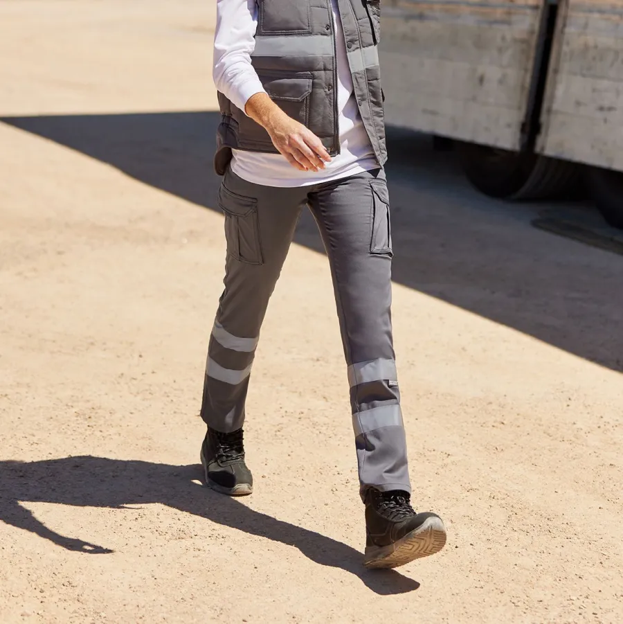 PANTALON STRETCH MULTIPOCHES À BANDES RÉFLÉCHISSANTES — Velilla personnalisable